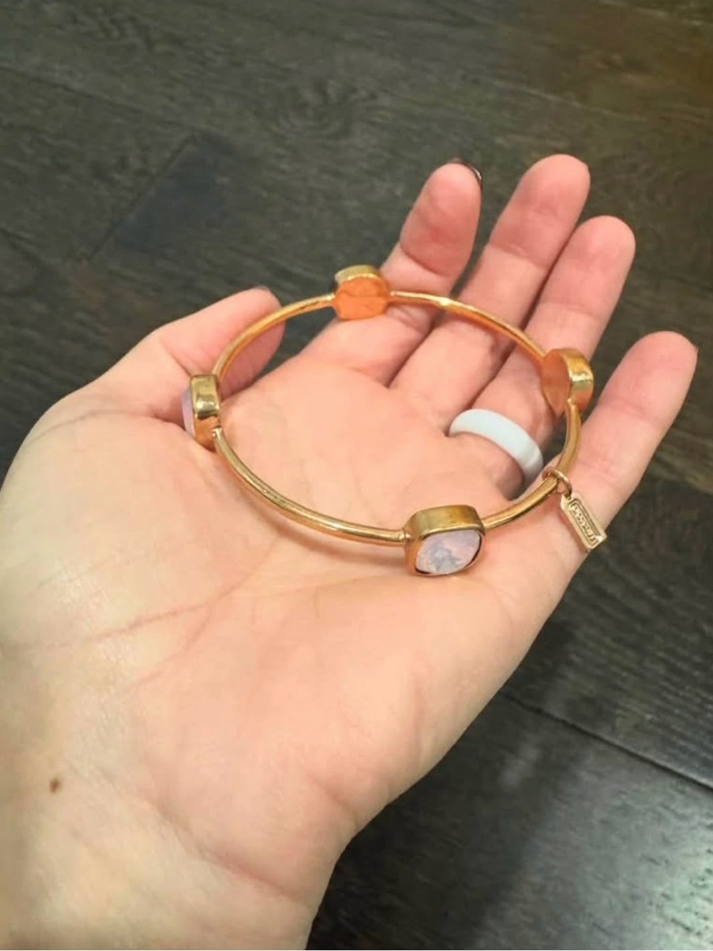 Coach Gold Tone Bangle Bracelet with Gemstone Accents